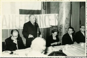 Menachem Begin is on left & Isidore Franckel is speaking